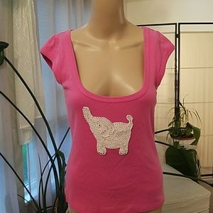 Adorable pink shirt with white elephant